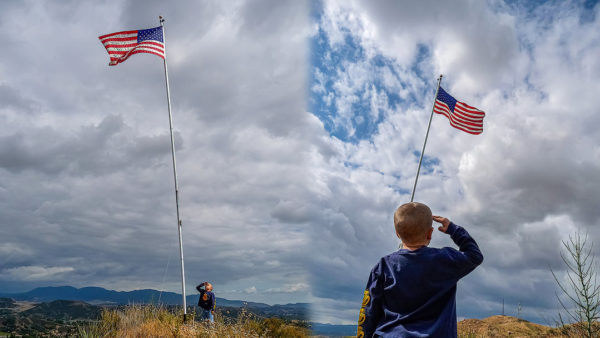 Isaiah Turner Salutes American Flag